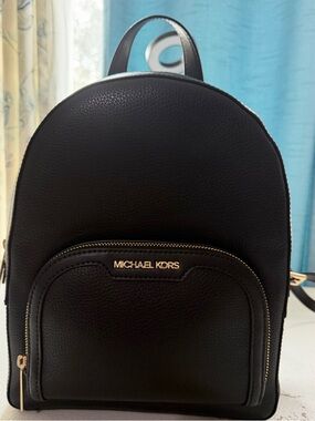 Michael Kors Black Pebbled Leather Mini Backpack with Gold Hardware